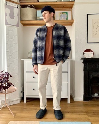 For a casual look, opt for a navy plaid wool bomber jacket and beige chinos — these two items work really well together. Complement your look with a pair of black canvas slip-on sneakers for maximum style effect.
