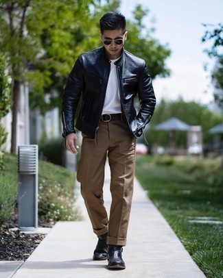 Chinos Outfits: One of the coolest ways for a man to style a black leather bomber jacket is to wear it with chinos for an off-duty outfit. If you need to effortlessly up the ante of this outfit with one single piece, why not complement this look with black leather chelsea boots?