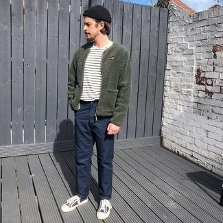 Dark Green Fleece Bomber Jacket Outfits For Men: A dark green fleece bomber jacket and navy chinos are the kind of a no-brainer casual outfit that you need when you have zero time. Complement this getup with black and white canvas low top sneakers to instantly bump up the wow factor of your look.