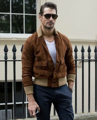 Brown Suede Bomber Jacket Outfits For Men: This casual pairing of a brown suede bomber jacket and black chinos is very easy to pull together in next to no time, helping you look amazing and ready for anything without spending a ton of time rummaging through your wardrobe.