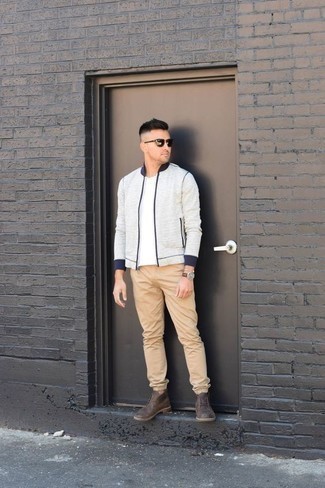 White Bomber Jacket Outfits For Men: If you like off-duty style, why not take this combo of a white bomber jacket and khaki chinos for a walk? If you're not sure how to round off, add a pair of brown leather desert boots to the mix.