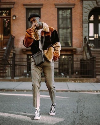 Black Canvas High Top Sneakers Outfits For Men: Pair a multi colored fur bomber jacket with grey plaid chinos to feel fully confident in yourself and look stylish. Inject a more relaxed vibe into this getup by rounding off with a pair of black canvas high top sneakers.