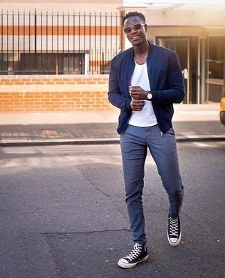 Blue Chinos Outfits: You'll be surprised at how easy it is for any gentleman to get dressed like this. Just a navy bomber jacket married with blue chinos. Rounding off with a pair of navy and white canvas high top sneakers is an effortless way to introduce a touch of stylish casualness to your look.