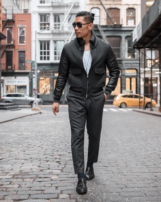 Charcoal Bomber Jacket Outfits For Men: A charcoal bomber jacket and black vertical striped chinos will convey this casually cool vibe. If you want to feel a bit fancier now, add black leather tassel loafers to the mix.