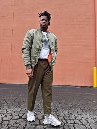 Mint Satin Bomber Jacket Outfits For Men: Want to infuse your closet with some effortless cool? Opt for a mint satin bomber jacket and olive chinos. Put a relaxed spin on your look by wearing a pair of white athletic shoes.