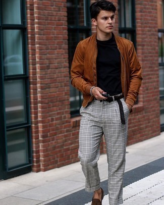 Tobacco Suede Bomber Jacket Outfits For Men: Teaming a tobacco suede bomber jacket and grey check chinos will cement your prowess in menswear styling even on weekend days. Take your look down a more elegant path by sporting dark brown suede tassel loafers.