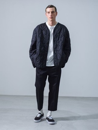 Navy Quilted Bomber Jacket Outfits For Men: Wear a navy quilted bomber jacket with navy chinos to flaunt your styling savvy. Black and white canvas low top sneakers make this ensemble whole.