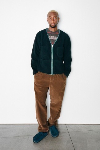 Brown Corduroy Chinos Outfits: If the situation permits casual style, opt for a navy fleece bomber jacket and brown corduroy chinos. Up your whole ensemble by rocking a pair of navy suede loafers.