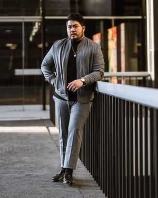 Charcoal Vertical Striped Bomber Jacket Outfits For Men: For something more on the cool and casual end, try this combo of a charcoal vertical striped bomber jacket and grey vertical striped chinos. Complete this outfit with black leather loafers to jazz things up.