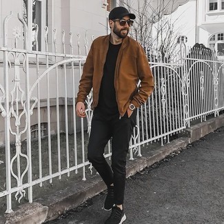 Tobacco Sunglasses Outfits For Men: Consider wearing a brown bomber jacket and tobacco sunglasses to assemble a seriously sharp and off-duty ensemble. Black and white athletic shoes tie the getup together.