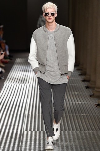 Charcoal Bomber Jacket Outfits For Men: You can be sure you'll look modern and stylish in a charcoal bomber jacket and charcoal dress pants. On the shoe front, go for something on the relaxed end of the spectrum with white and black athletic shoes.