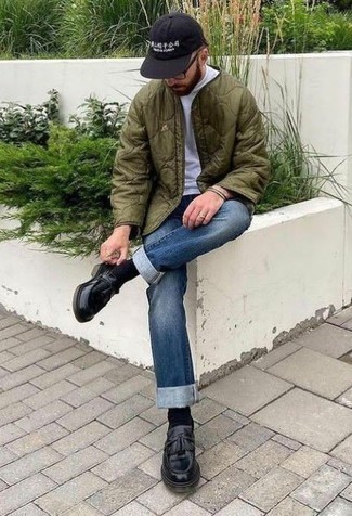 Olive Quilted Bomber Jacket Outfits For Men: This casual pairing of an olive quilted bomber jacket and blue jeans is perfect if you need to feel confident in your outfit. Take your getup in a more sophisticated direction by rocking black leather tassel loafers.