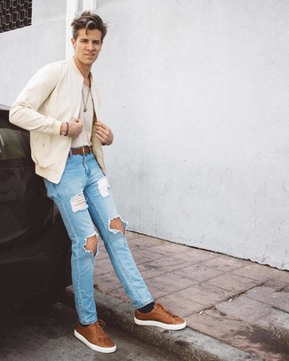 Men's Beige Bomber Jacket, Beige Crew-neck T-shirt, Light Blue Ripped Jeans, Brown Leather Low Top Sneakers