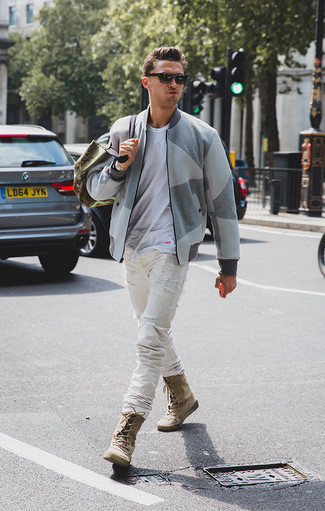 Grey Bomber Jacket Outfits For Men: A grey bomber jacket and white ripped jeans are awesome menswear essentials to incorporate into your current off-duty wardrobe. If you feel like stepping it up, complete your ensemble with a pair of tan suede casual boots.