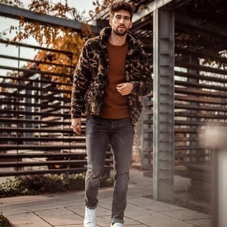 Olive Camouflage Fleece Bomber Jacket Outfits For Men: An olive camouflage fleece bomber jacket and grey ripped jeans worn together are a smart match. To introduce some extra definition to this ensemble, introduce a pair of white canvas low top sneakers to the mix.