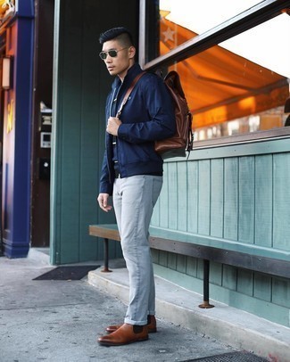 Dark Green Sunglasses Outfits For Men: If you’re a jeans-and-a-tee kind of guy, you'll like this low-key combination of a navy bomber jacket and dark green sunglasses. A pair of brown leather chelsea boots immediately turns up the classy factor of this outfit.