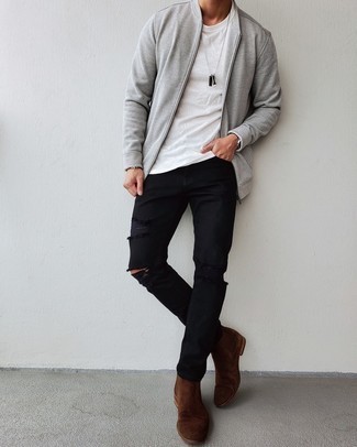 Grey Bomber Jacket Outfits For Men: A grey bomber jacket and black ripped jeans are great menswear must-haves to add to your day-to-day fashion mix. Dial up your whole look by slipping into dark brown suede chelsea boots.