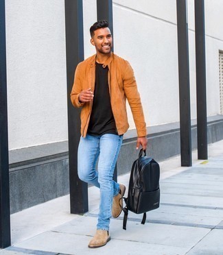 Tan Suede Chelsea Boots Outfits For Men: To achieve a relaxed look with a modern finish, you can rock a tobacco suede bomber jacket and light blue jeans. Make your ensemble a bit dressier by finishing off with tan suede chelsea boots.