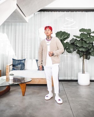 White Sweatpants Outfits For Men: For a safe casual option, you can always rely on this combo of a beige fleece bomber jacket and white sweatpants. Our favorite of an infinite number of ways to finish off this getup is white print canvas low top sneakers.