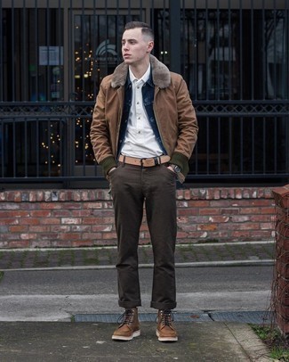 Brown Bomber Jacket Outfits For Men: A brown bomber jacket looks so cool when worn with dark brown chinos. Don't know how to complement your outfit? Rock brown leather casual boots to rev up the fashion factor.