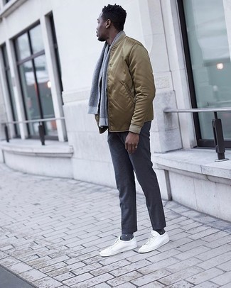 Tan Satin Bomber Jacket Outfits For Men: Wear a tan satin bomber jacket and navy dress pants to look like a perfect gentleman at all times. For something more on the off-duty side to finish this outfit, complement your look with white canvas low top sneakers.