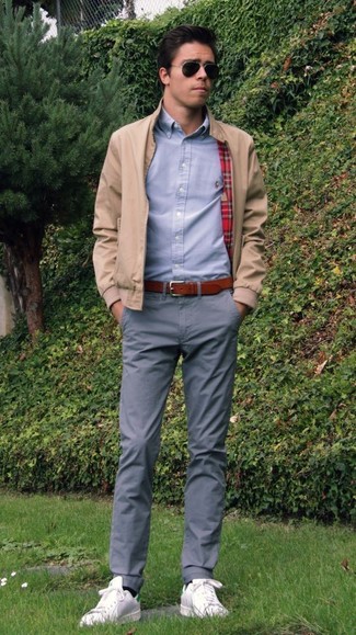 Tan Bomber Jacket Outfits For Men: A tan bomber jacket and grey chinos are absolute menswear must-haves that will integrate perfectly within your current styling routine. And if you wish to effortlessly dress down your getup with footwear, why not add white leather low top sneakers to the equation?