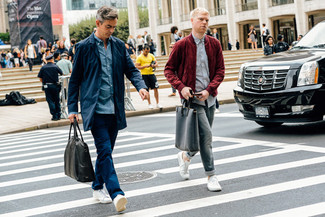 Grey Canvas Tote Bag Outfits For Men: For relaxed dressing with a twist, wear a red suede bomber jacket and a grey canvas tote bag. White low top sneakers will infuse a sense of elegance into an otherwise standard outfit.