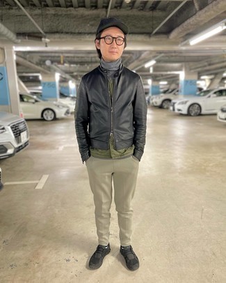 Olive Quilted Gilet Outfits For Men: Teaming an olive quilted gilet with beige sweatpants is an awesome choice for a casual outfit. Let your sartorial sensibilities really shine by finishing this look with black athletic shoes.