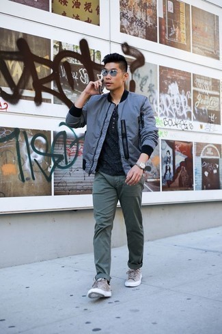 Grey Suede Low Top Sneakers Outfits For Men: For an off-duty look, pair a blue bomber jacket with dark green chinos — these two pieces go really well together. Rounding off with a pair of grey suede low top sneakers is an easy way to inject a touch of stylish nonchalance into your ensemble.