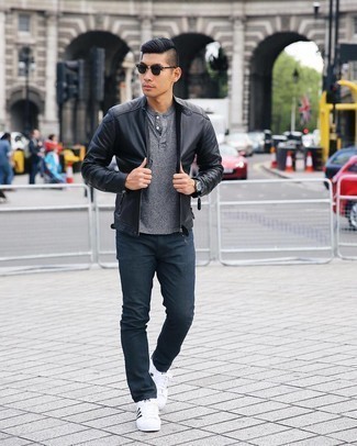 Grey Henley Shirt Outfits For Men: You'll be amazed at how extremely easy it is for any man to get dressed like this. Just a grey henley shirt paired with charcoal chinos. Let your sartorial savvy really shine by finishing off this outfit with white and black canvas low top sneakers.