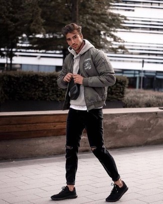 Grey Bomber Jacket Outfits For Men: For a modern casual outfit, Reach for a grey bomber jacket and black ripped jeans. Let your styling chops really shine by complementing your getup with a pair of black athletic shoes.