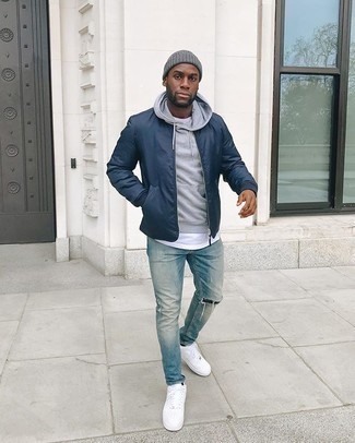 Charcoal Beanie Outfits For Men: Such staples as a navy bomber jacket and a charcoal beanie are an easy way to introduce effortless cool into your casual styling lineup. A great pair of white canvas low top sneakers is a simple way to add a little kick to the outfit.