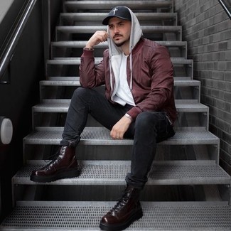 Charcoal Jeans Outfits For Men: If you prefer a more laid-back approach to style, why not dress in a burgundy bomber jacket and charcoal jeans? A cool pair of burgundy leather casual boots is an effective way to add a little kick to the ensemble.