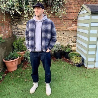 Grey Hoodie Outfits For Men: This pairing of a grey hoodie and navy jeans is perfect for off-duty days. Our favorite of a variety of ways to complement this look is with a pair of white canvas high top sneakers.