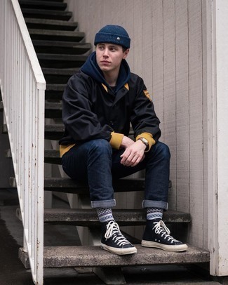 Navy Hoodie Outfits For Men: A navy hoodie and navy jeans are must-have menswear pieces, without which no wardrobe would be complete. If you need to immediately dial down your ensemble with footwear, why not add black canvas high top sneakers to the equation?