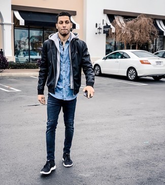 Charcoal Hoodie Outfits For Men: Wear a charcoal hoodie and black ripped skinny jeans for a look that's both modern casual and dapper. If you're hesitant about how to finish, a pair of black and white athletic shoes is a good choice.