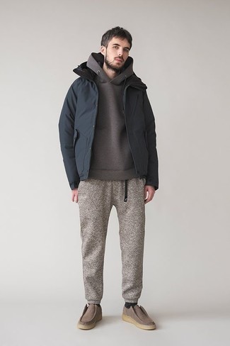 500+ Outfits For Men In Their 30s: A navy bomber jacket looks so casually cool when worn with grey wool sweatpants. Brown suede loafers will instantly polish up even your most comfortable clothes. If you frequently wonder how to dress appropriately for your age, this combo is a wonderful example.
