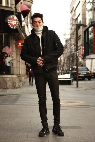 Black Bomber Jacket Chill Weather Outfits For Men: This is hard proof that a black bomber jacket and black skinny jeans are awesome when teamed together in a relaxed menswear style. Add a pair of black and white athletic shoes to the mix to instantly bump up the fashion factor of your outfit.