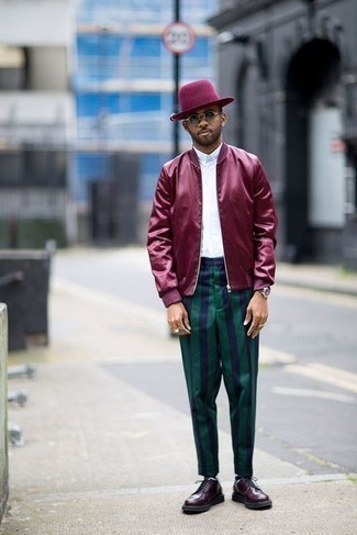 Burgundy Wool Hat Outfits For Men: This off-duty combo of a burgundy bomber jacket and a burgundy wool hat is very easy to pull together without a second thought, helping you look awesome and prepared for anything without spending too much time going through your closet. A pair of burgundy leather derby shoes effortlessly turns up the wow factor of this look.