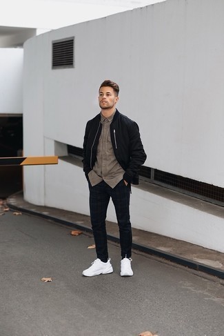 Black Bomber Jacket Outfits For Men: This ensemble with a black bomber jacket and navy and green plaid chinos isn't so hard to pull off and leaves room to more creative experimentation. Throw white athletic shoes in the mix to immediately step up the appeal of your outfit.