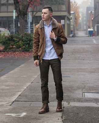Brown Bomber Jacket Outfits For Men: This pairing of a brown bomber jacket and dark green chinos will cement your skills in men's fashion even on off-duty days. Dark brown leather casual boots will easily smarten up even the most basic getup.