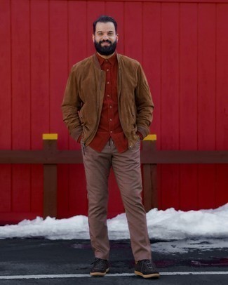 Red Corduroy Long Sleeve Shirt Outfits For Men: A red corduroy long sleeve shirt and brown plaid chinos are a pairing that every sartorially savvy man should have in his casual arsenal. Complete your ensemble with a pair of dark brown suede low top sneakers and ta-da: this outfit is complete.