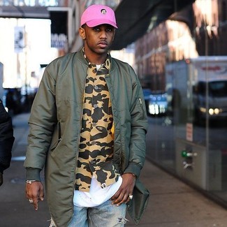 Pink Baseball Cap Outfits For Men: To achieve a casual look with a modern take, you can rely on an olive bomber jacket and a pink baseball cap.