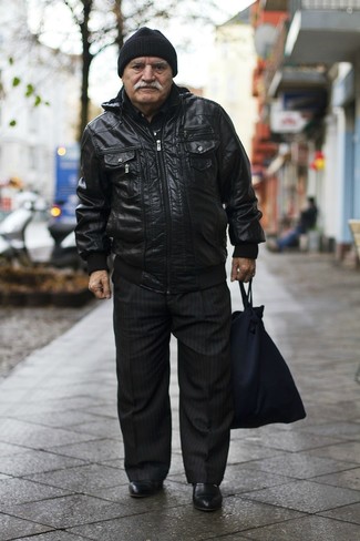 Black Bomber Jacket Outfits For Men After 60: You'll be amazed at how extremely easy it is for any guy to get dressed like this. Just a black bomber jacket matched with black vertical striped dress pants. Our favorite of an endless number of ways to finish off this outfit is black leather chelsea boots. This ensemble proves that even after 60 your outfit options are still looking good.