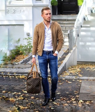Dark Brown Leather Holdall Outfits For Men: A tan suede bomber jacket and a dark brown leather holdall are a good look worth having in your daily casual routine. Make a bit more effort with shoes and complete this outfit with a pair of black leather double monks.
