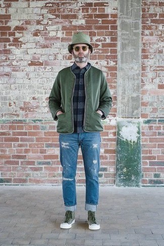 Olive Canvas High Top Sneakers Outfits For Men: A dark green bomber jacket and blue ripped jeans are great menswear elements to add to your casual styling routine. A pair of olive canvas high top sneakers makes this ensemble complete.