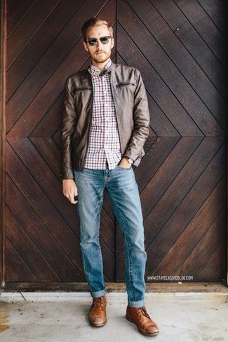 Dark Brown Leather Bomber Jacket Outfits For Men: Try pairing a dark brown leather bomber jacket with light blue jeans to assemble an interesting and current laid-back ensemble. Brown leather casual boots will put a different spin on this outfit.