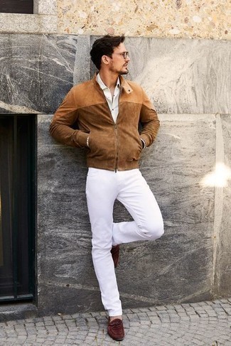 Tobacco Suede Bomber Jacket Smart Casual Warm Weather Outfits For Men: Channel your inner laid-back self and try teaming a tobacco suede bomber jacket with white jeans. To bring a bit of depth to this outfit, introduce a pair of dark brown suede loafers to the mix.