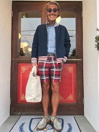 Red Plaid Shorts Outfits For Men: A navy bomber jacket looks so casually stylish when matched with red plaid shorts. You can take a sleeker approach with footwear and add grey suede desert boots to the equation.