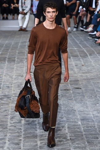 Brown Long Sleeve T-Shirt Outfits For Men: Try pairing a brown long sleeve t-shirt with brown dress pants if you want to look seriously stylish without putting in too much time. Dark brown leather chelsea boots will bring an added dose of style to an otherwise utilitarian ensemble.